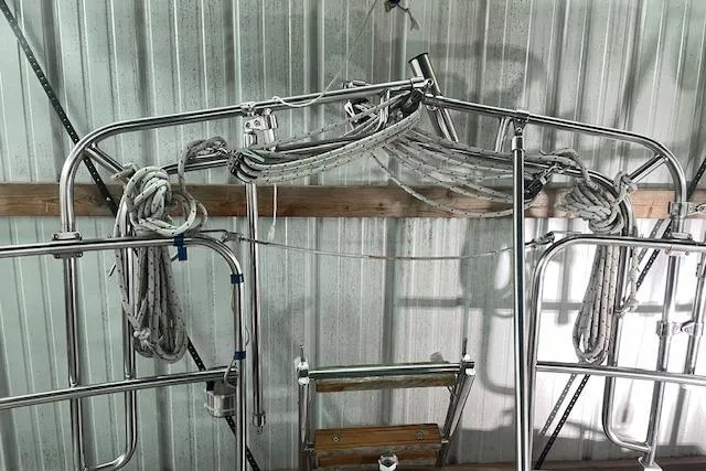 Slide: The Image of Stainless steel boat rigging and ropes on 1984 Endeavour 35 sailboat in storage. - 18