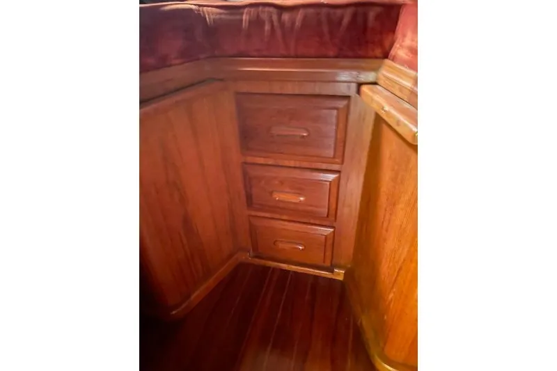 Slide: The Image of Wooden interior drawers on a 1984 Endeavour 35 sailboat. - 21