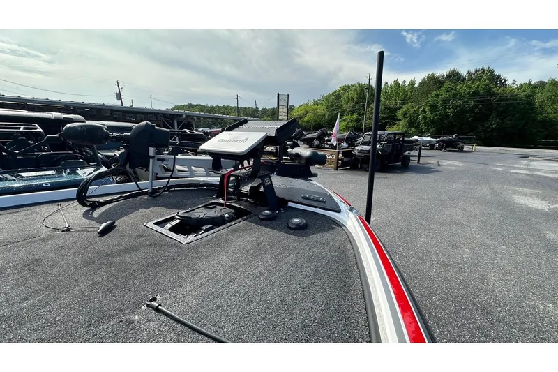 Slide: The Image of 2023 Nitro Z20 Pro boat with advanced Garmin navigation system, parked outdoors. - 3