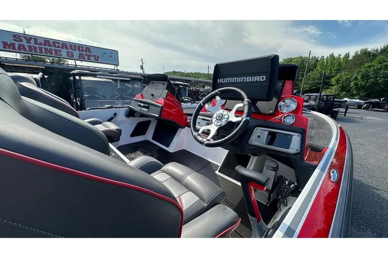 Slide: The Image of 2023 Nitro Z20 Pro boat interior with steering wheel and Humminbird electronics. - 6