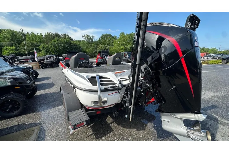 Slide: The Image of 2023 Nitro Z20 Pro boat with powerful engine, parked outdoors on a sunny day. - 71