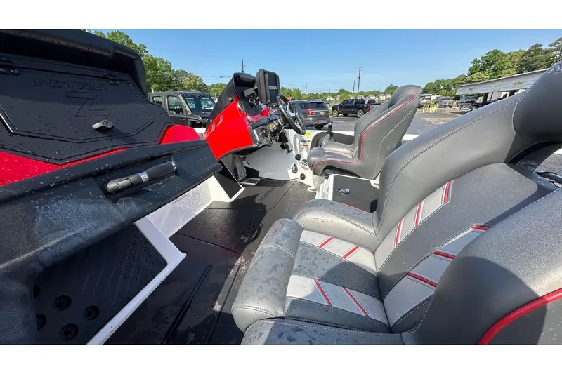 Slide: The Image of Interior of 2023 Nitro Z20 Pro boat with sleek seating and modern dashboard design. - 8