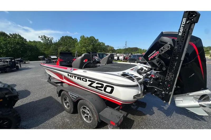 Slide: The Image of 2023 Nitro Z20 Pro boat with Mercury Pro XS engine, parked outdoors. - 9