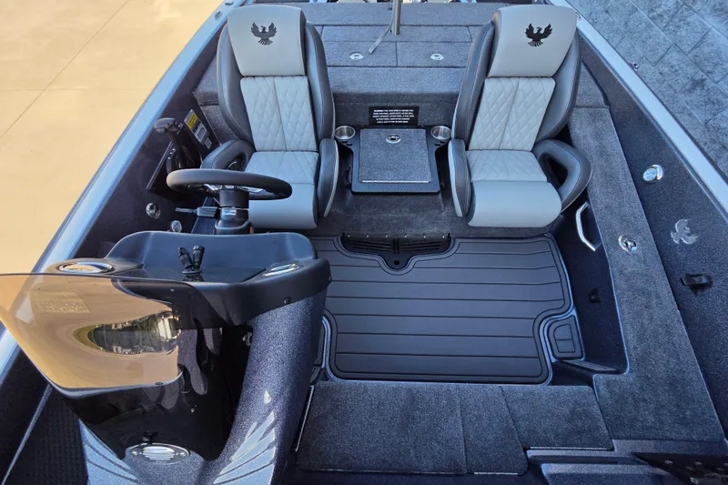 Slide: The Image of Interior of 2026 Phoenix 818 Pro boat with dual seats and steering console. - 11