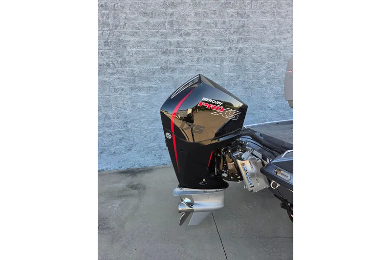 Slide: The Image of Outboard motor on a 2026 Phoenix 818 Pro boat, featuring Mercury Pro XS branding. - 4