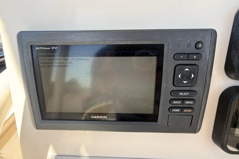 Slide: The Image of Garmin echoMAP 74dv device on 2015 Key West 210 Bay Reef boat dashboard. - 13
