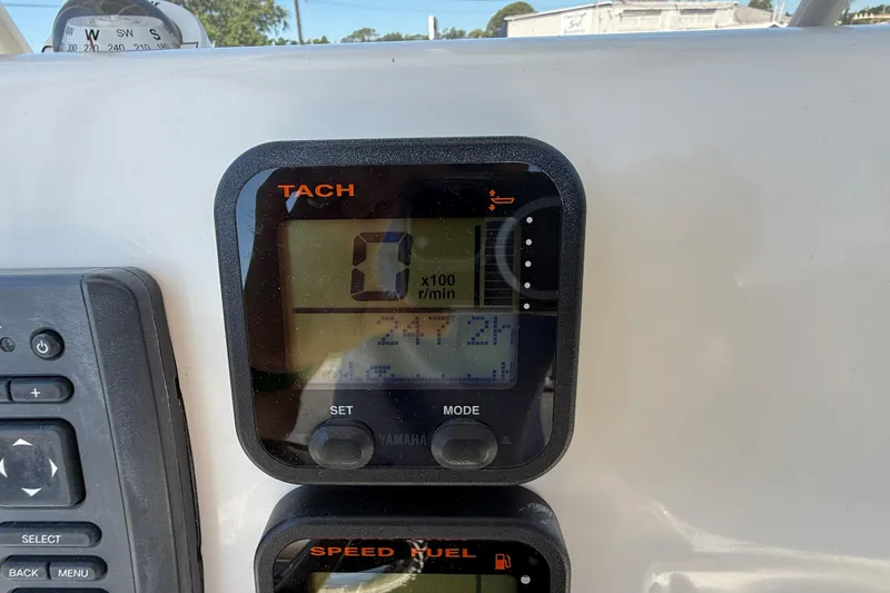 Slide: The Image of Tachometer display on 2015 Key West 210 Bay Reef boat dashboard. - 14