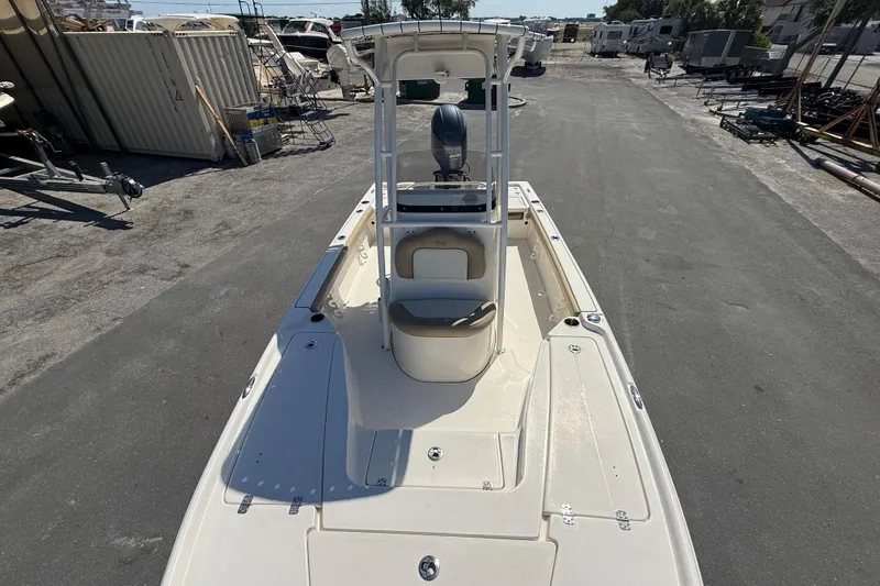 Slide: The Image of 2015 Key West 210 Bay Reef boat on display in a marina. - 21