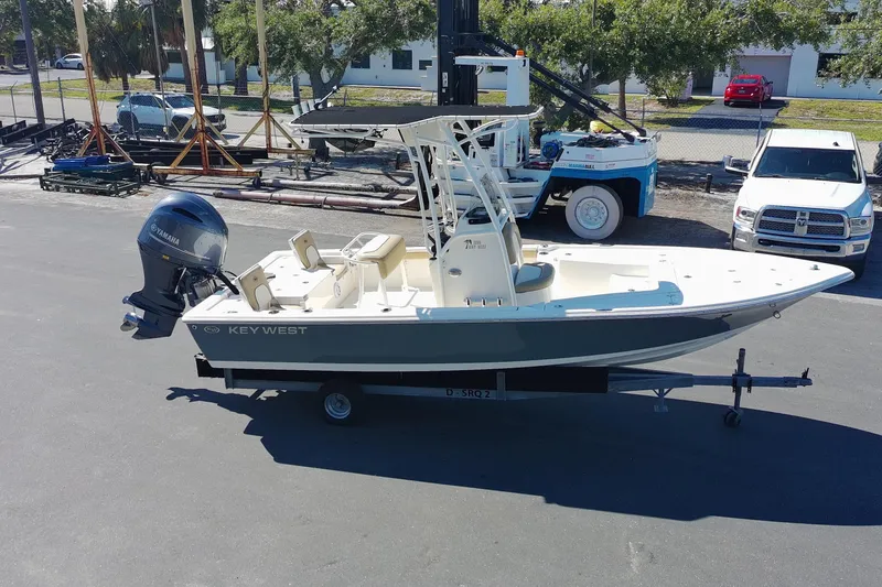 Slide: The Image of 2015 Key West 210 Bay Reef boat on trailer with Yamaha outboard motor. - 5