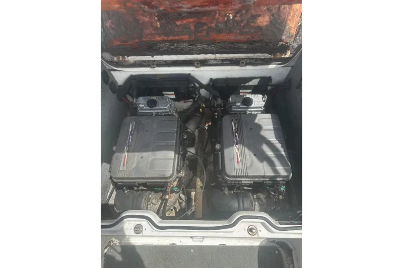 Slide: The Image of 2008 Yamaha Boats SX230 engine compartment with dual engines visible. - 23