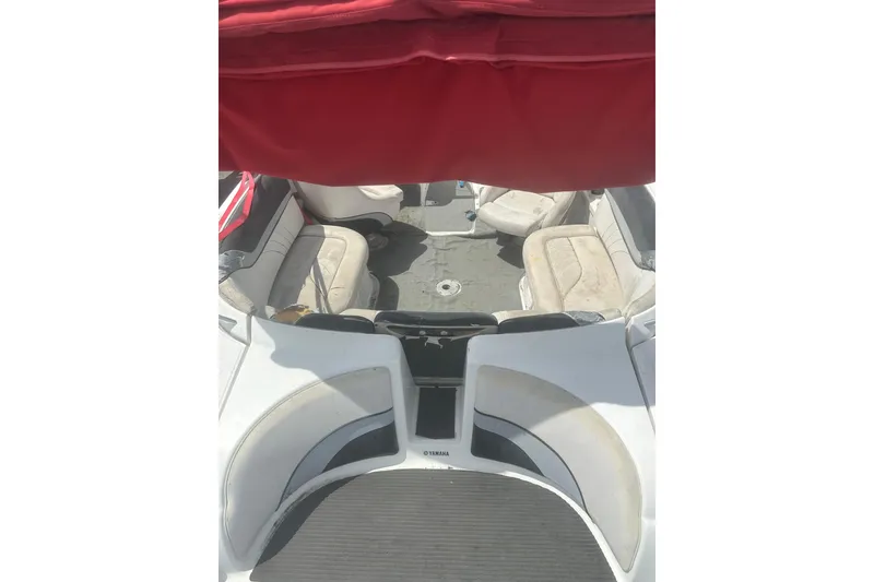 Slide: The Image of 2008 Yamaha Boats SX230 interior with red canopy and white seating. - 5