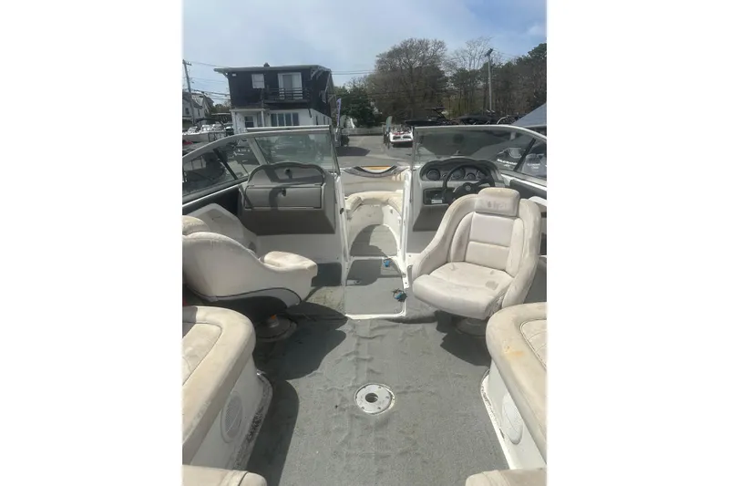 Slide: The Image of 2008 Yamaha Boats SX230 interior with seating and dashboard view. - 6