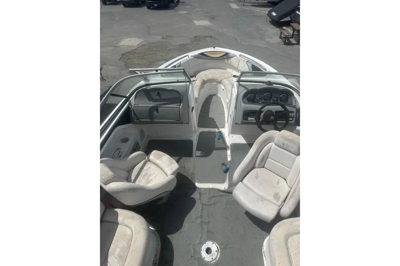 Slide: The Image of 2008 Yamaha Boats SX230 interior with seating and dashboard view. - 8