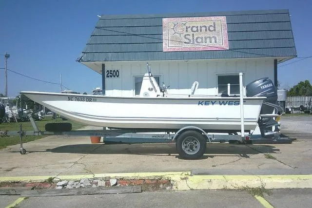 The Image of 2010 Key West 197 Skiff boat on trailer, parked outside Grand Slam building. - 1