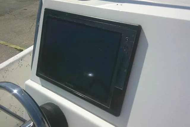 Slide: The Image of Dashboard of a 2010 Key West 197 Skiff boat with a mounted display screen. - 14