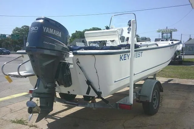 Slide: The Image of 2010 Key West 197 Skiff boat with Yamaha 90 engine on trailer. - 5