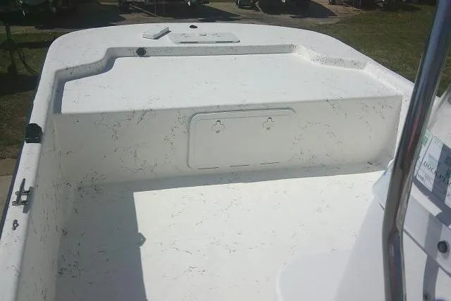 Slide: The Image of 2010 Key West 197 Skiff boat interior with white textured deck. - 9