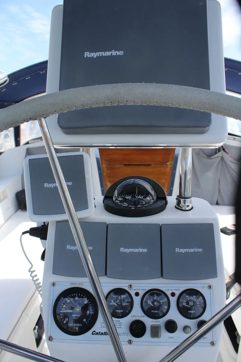 Slide: The Image of Helm of a 2004 Catalina 42 MkII yacht with Raymarine instruments. - 14