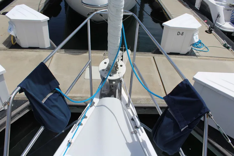 Slide: The Image of Bow view of a Catalina 42 MkII yacht docked in marina. - 2