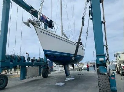 Slide: The Image of 2004 Catalina 42 MkII sailboat in boat lift. - 20