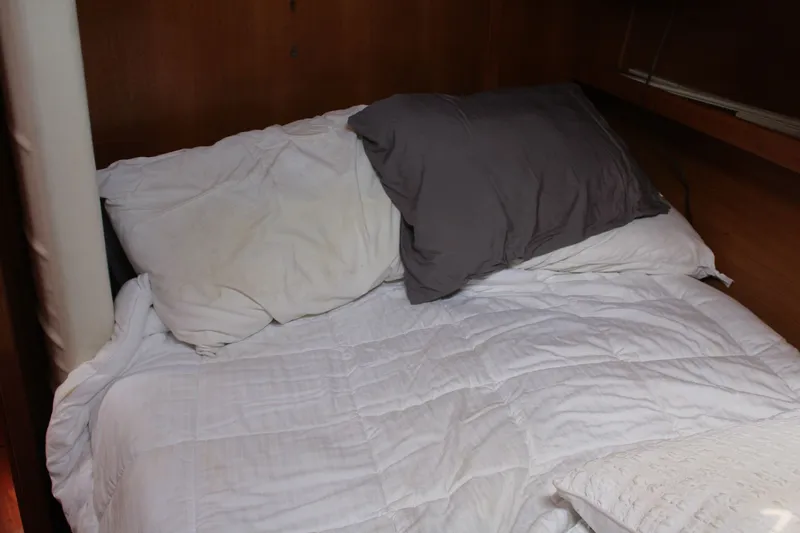 Slide: The Image of Interior of a Catalina 42 MkII yacht with cozy bed. - 25