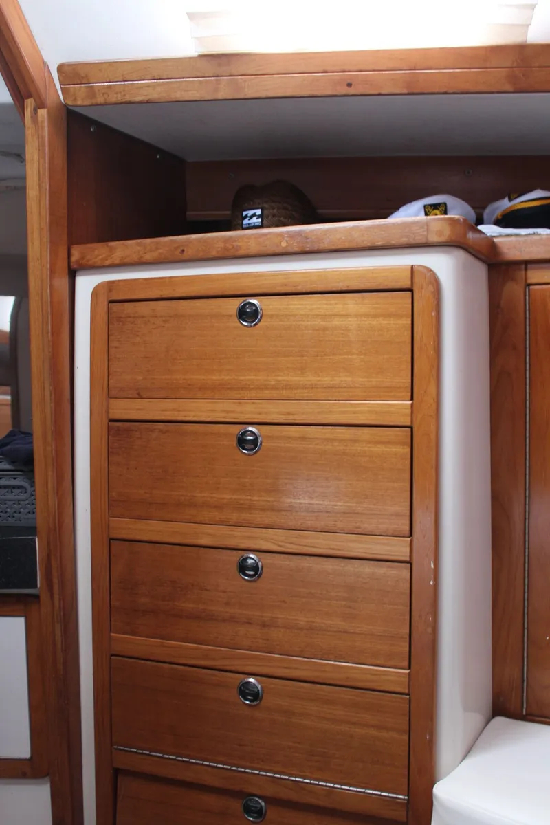 Slide: The Image of Wooden drawers inside a 2004 Catalina 42 MkII yacht. - 26