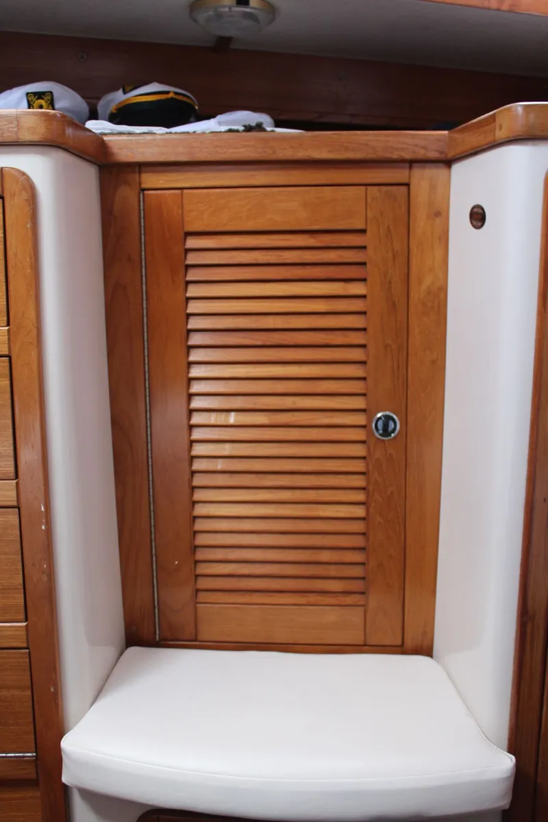 Slide: The Image of Interior of Catalina 42 MkII yacht, wooden door and seat. - 27