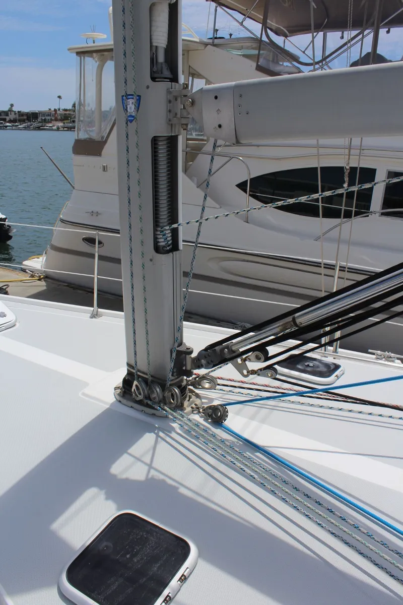 Slide: The Image of Close-up of a 2004 Catalina 42 MkII mast in harbor. - 4