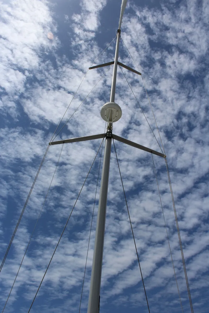 Slide: The Image of Mast of a Catalina 42 MkII sailboat against a cloudy sky. - 5