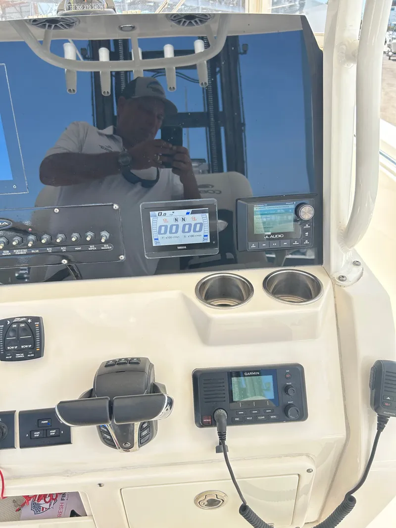 Slide: The Image of Dashboard of Cobia 262 Center Console boat, year 2022. - 12