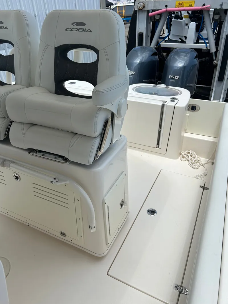 Slide: The Image of Interior of a 2022 Cobia 262 Center Console boat with seating. - 20