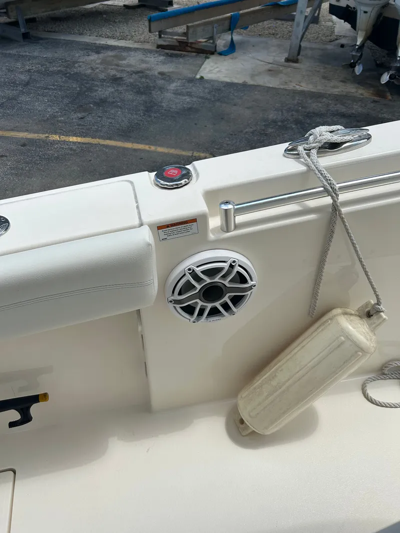 Slide: The Image of Cobia 262 Center Console 2022 with speaker and fender. - 29