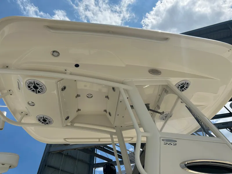 Slide: The Image of Cobia 262 Center Console 2022 with speakers and sky view. - 45