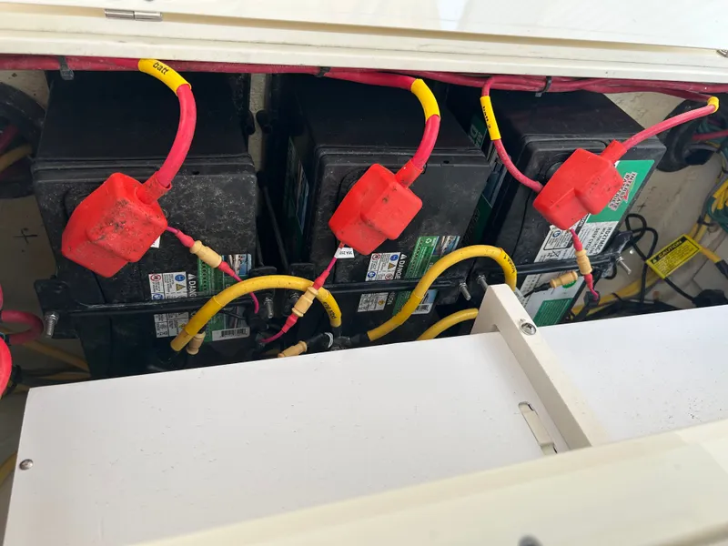 Slide: The Image of Batteries in 2022 Cobia 262 Center Console boat. - 8