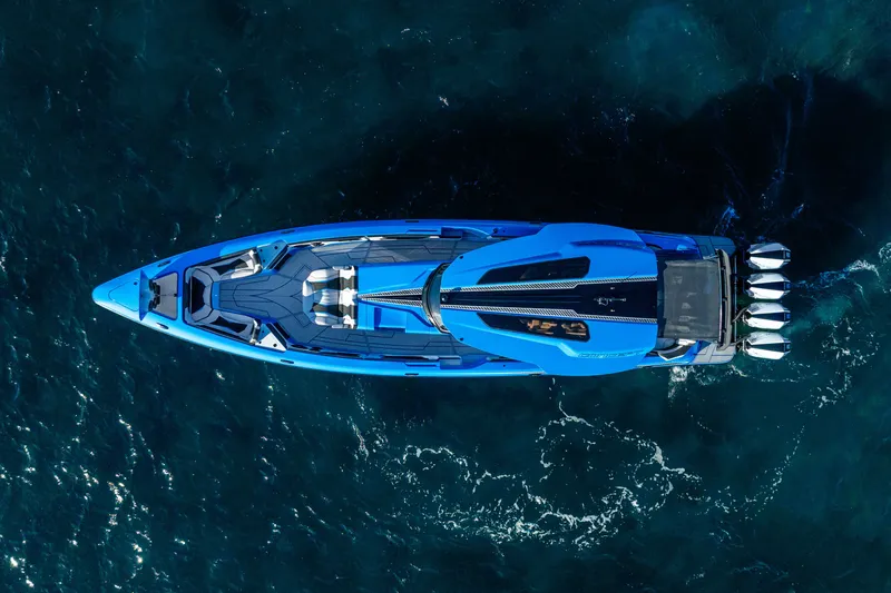Slide: The Image of Aerial view of blue 2026 Concept 44' Open Deck boat on the sea. - 2