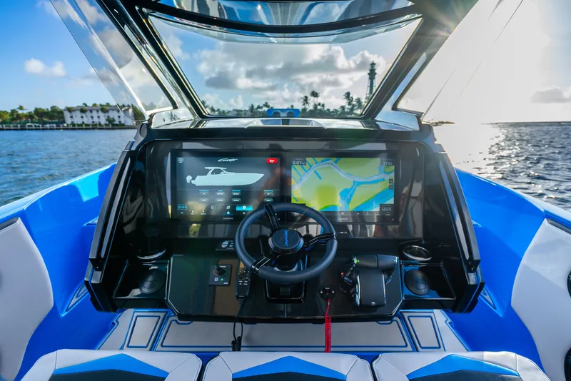 Slide: The Image of Futuristic cockpit of Concept 44' Open Deck 2026 on the water. - 20