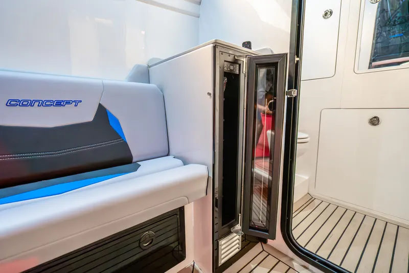 Slide: The Image of Interior of Concept 44' Open Deck 2026 with seating and fridge. - 7