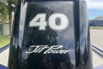 Slide: The Image of 2019 Tracker Pro 170 boat engine with "40 Jet Power" branding. - 6