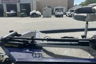 Slide: The Image of 2019 Tracker Pro 170 boat with trolling motor in a parking lot. - 7