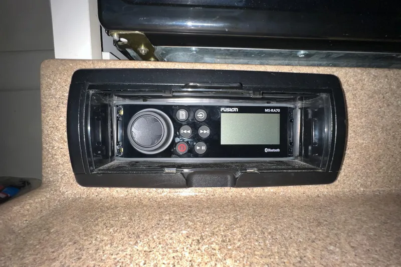 Slide: The Image of Fusion MS-RA70 Bluetooth stereo system in a 2002 Larson Cabrio 254 boat. - 15