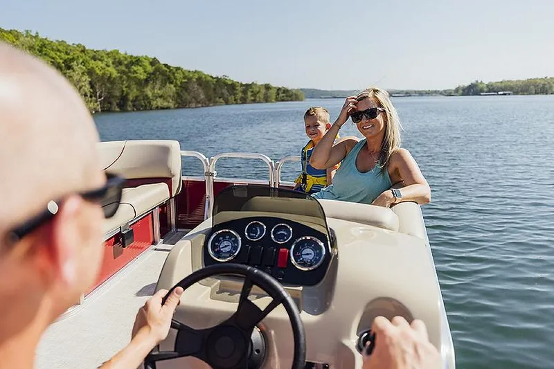 Slide: The Image of Manufacturer Provided Image: Family enjoying a ride on a 2023 Lowe Ultra 202 Fish & Cruise boat. - 3