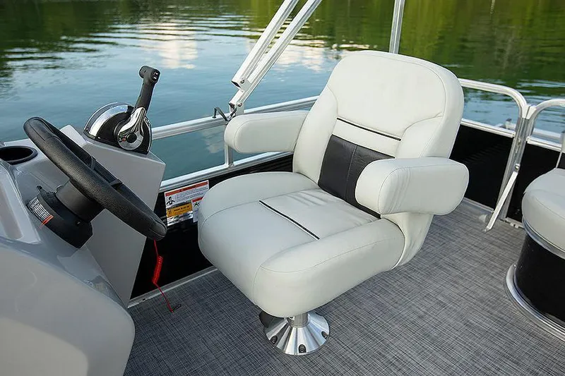 Slide: The Image of Manufacturer Provided Image: 2023 Lowe Ultra 202 Fish & Cruise boat interior with captain's chair and steering console. - 6