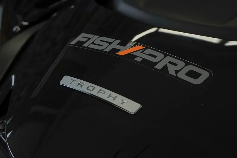 Slide: The Image of Close-up of 2026 Sea-Doo FishPro Trophy 170 logo on black surface. - 9