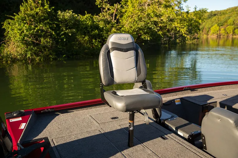 Slide: The Image of Manufacturer Provided Image: Lowe Stinger 175C 2021 boat seat on deck by a serene lake. - 8