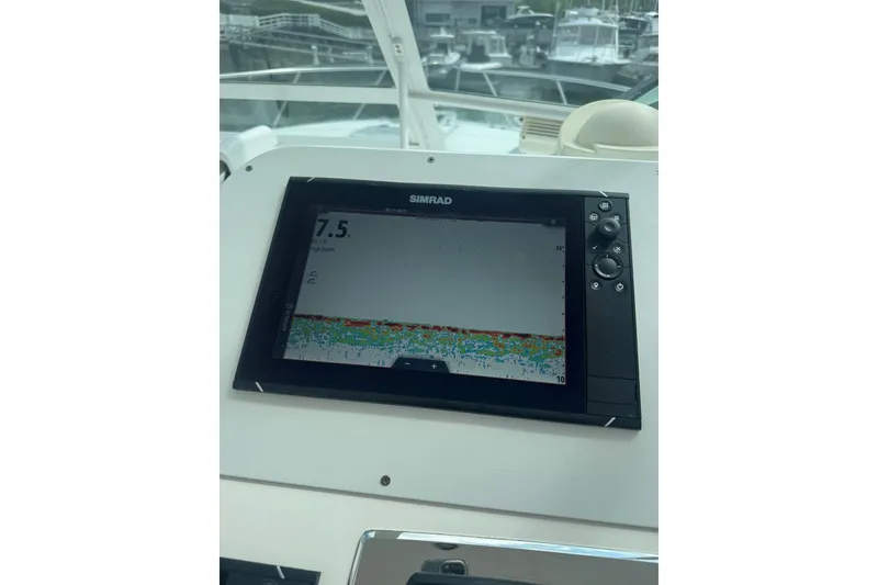 Slide: The Image of Simrad display on 2008 Cabo 32 Express boat, showing sonar data. - 16
