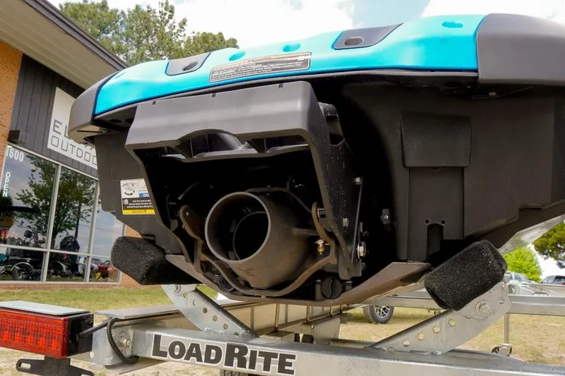 Slide: The Image of 2026 Sea-Doo Spark Trixx on trailer, rear view showing exhaust system. - 10