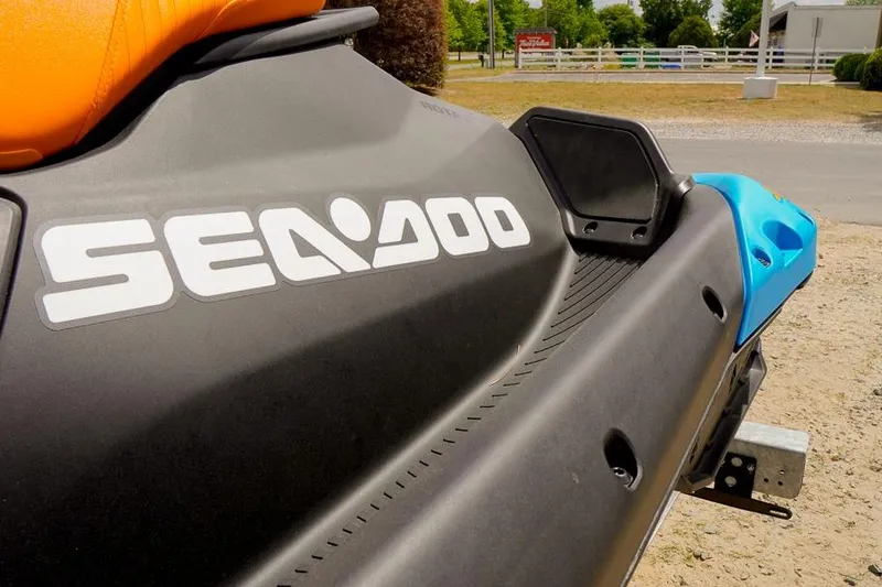Slide: The Image of 2026 Sea-Doo Spark Trixx for 1, featuring vibrant orange and blue design. - 6