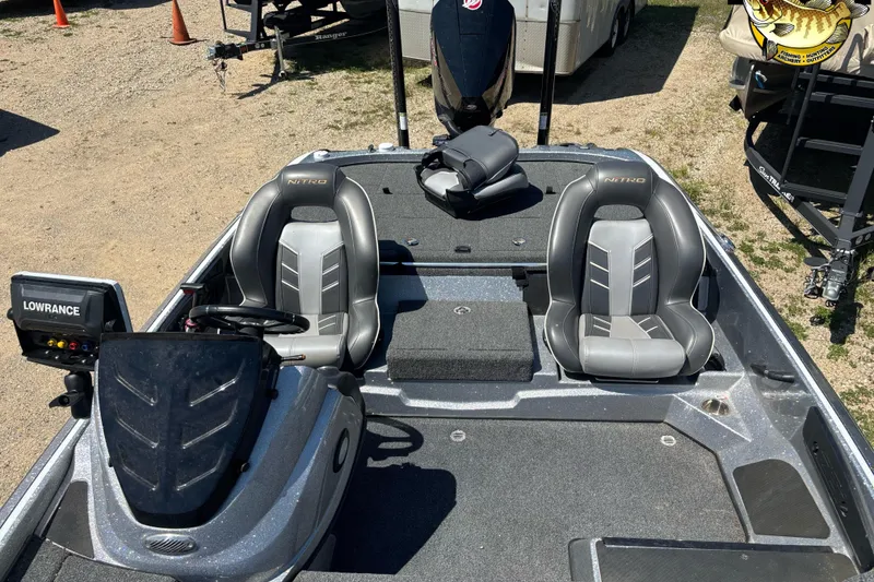 Slide: The Image of 2019 Nitro Z21 boat interior with dual seats and Lowrance navigation system. - 5