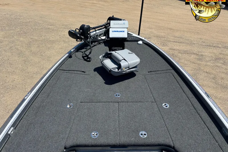 Slide: The Image of 2019 Nitro Z21 boat deck with Garmin and Lowrance equipment, on sandy terrain. - 8