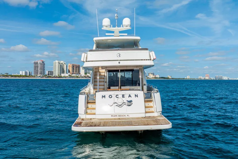Slide: The Image of Ocean Alexander 70E Motoryacht 2021 cruising near Miami Beach skyline. - 3